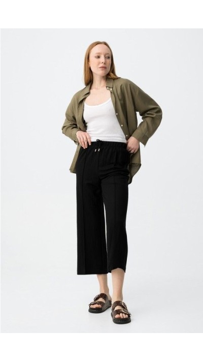 pantalón culotte fluído negro y beige