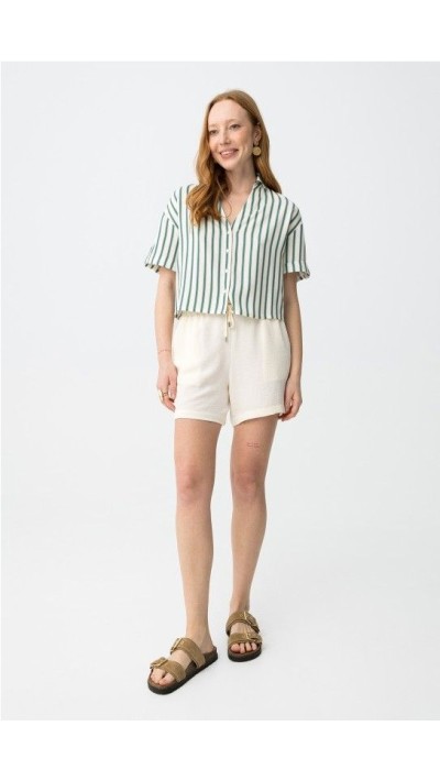 short tela goma en cintura , muy fluído y cómodo