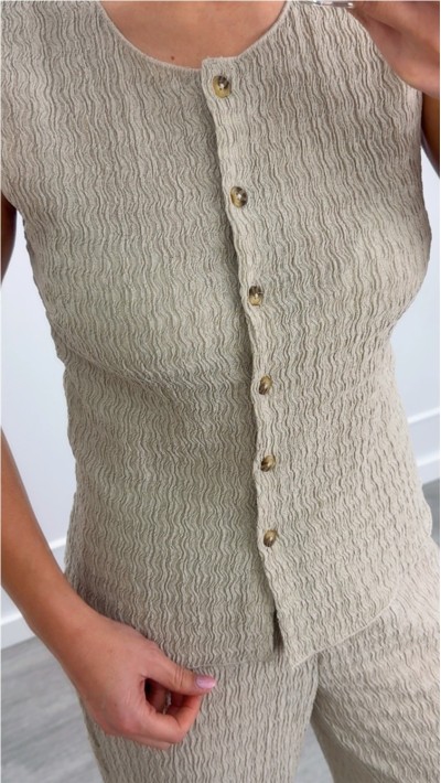 CHALECO ELÁSTICO BOTONES DELANTEROS