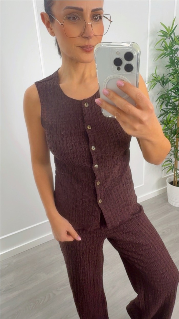 CHALECO ELÁSTICO BOTONES DELANTEROS