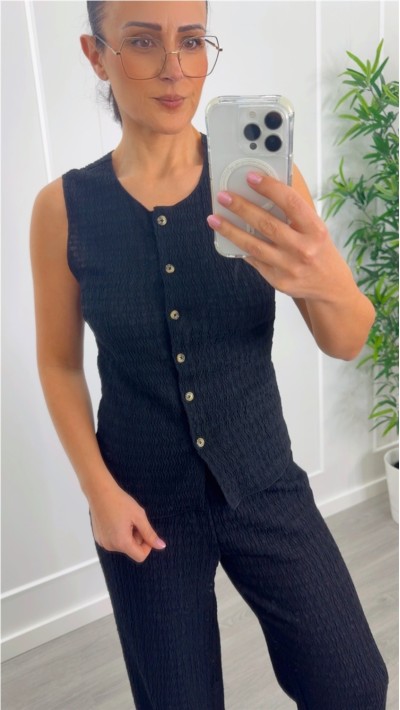 CHALECO ELÁSTICO BOTONES DELANTEROS