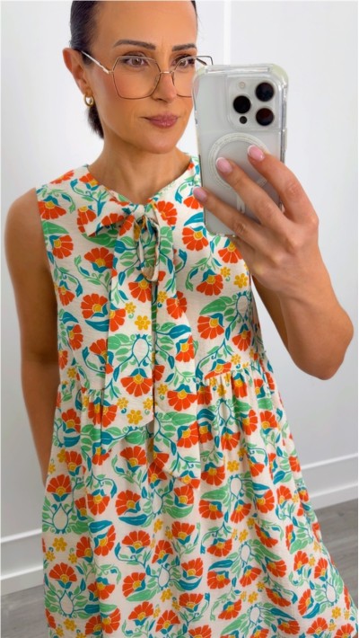 VESTIDO ESTAMPADO CON LAZO EN EL CUELLO Y BOLSILLOS