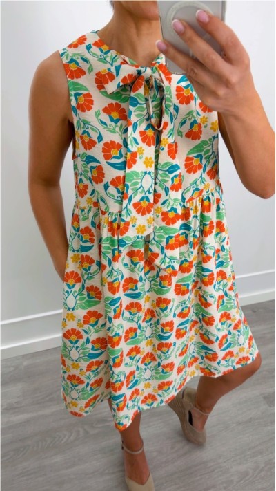 VESTIDO ESTAMPADO CON LAZO EN EL CUELLO Y BOLSILLOS