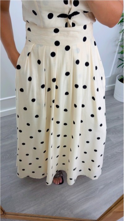FALDA LARGA CINTURA ALTA FONDO BEIGE LUNAR EN NEGRO